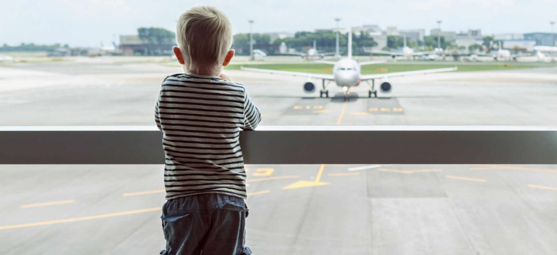 boy waiting for flight boarding